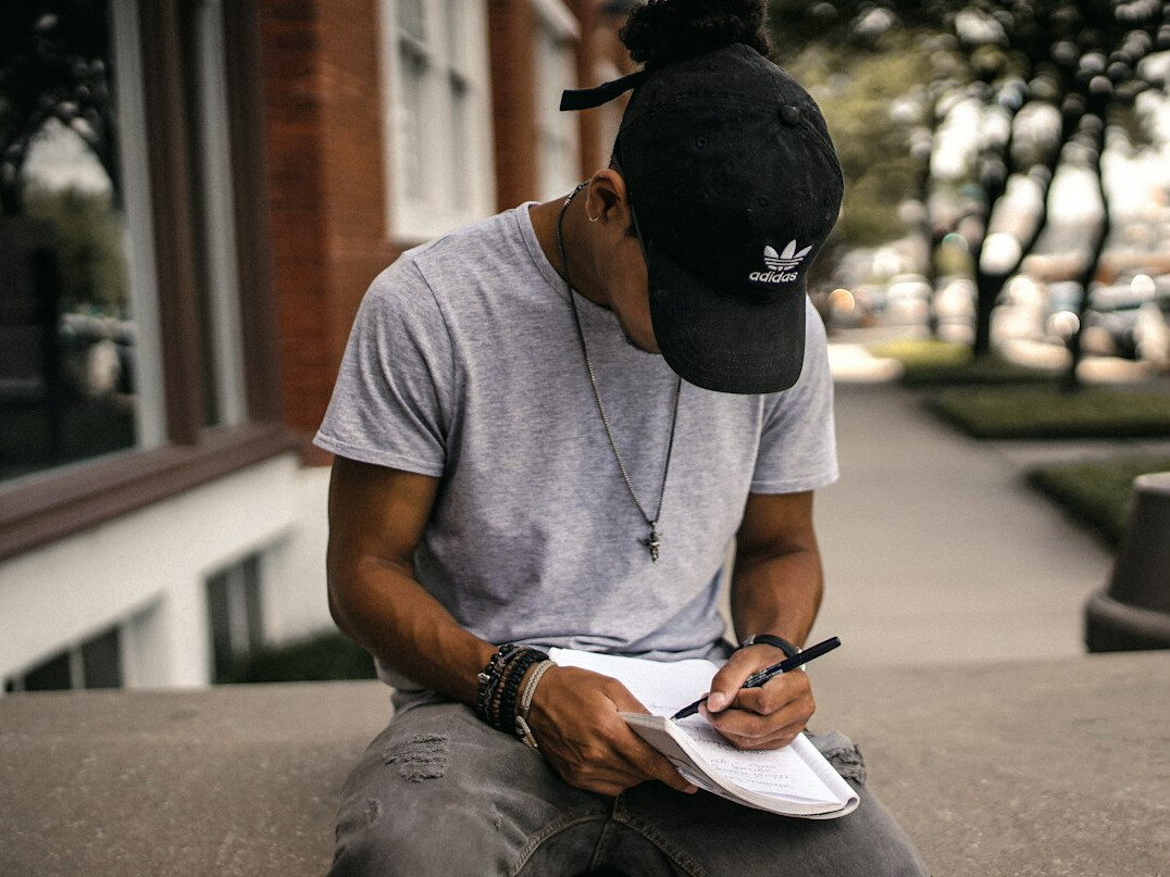 person journaling emotions