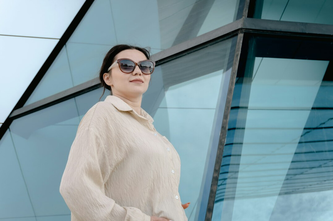 confident person looking in mirror